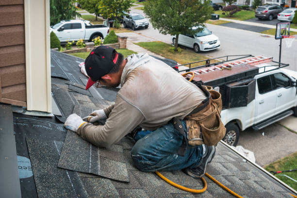 Professional Gutter Repair And Installation technician working in Hazelwood, MO